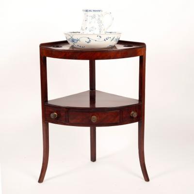 Appraisal: A George III mahogany corner washstand with ceramic bowl and