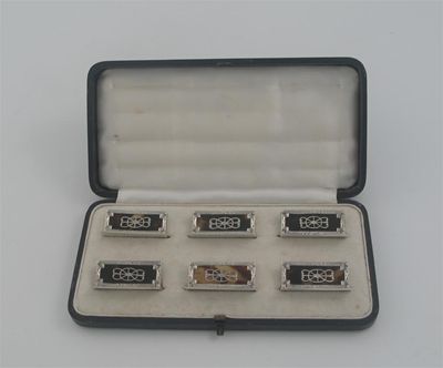 Appraisal: A modern cased set of six inlaid tortoiseshell place card