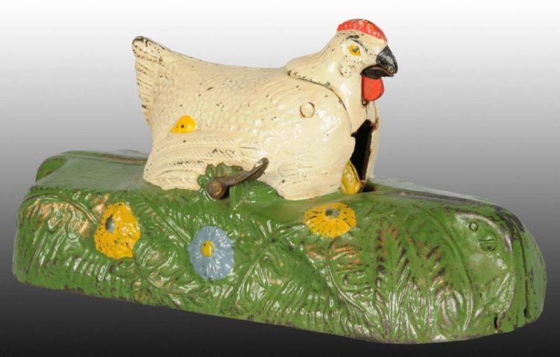 Appraisal: Cast Iron Hen Chick Mechanical Bank Description Manufactured by J