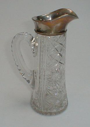 Appraisal: An Edward VII period silver mounted cut glass jug by