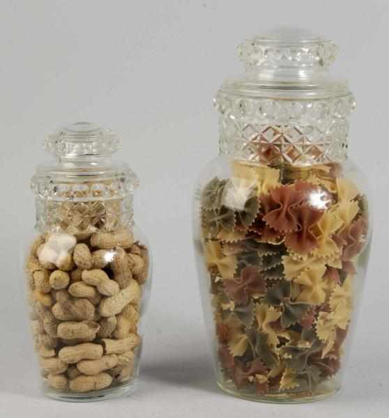 Appraisal: Lot of Matching Display Jars with Lids Description Both are