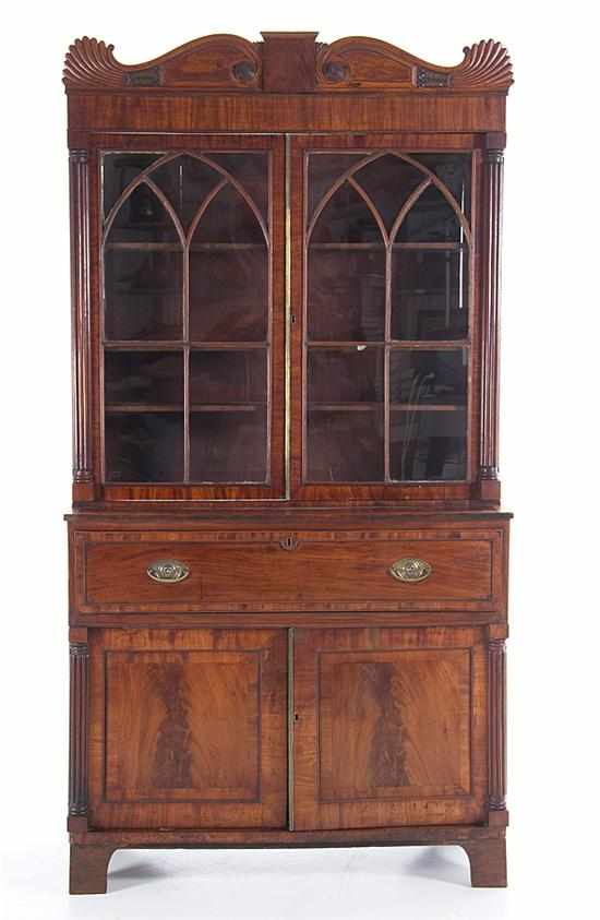 Appraisal: Regency mahogany secretary bookcase circa top section with scroll pediment