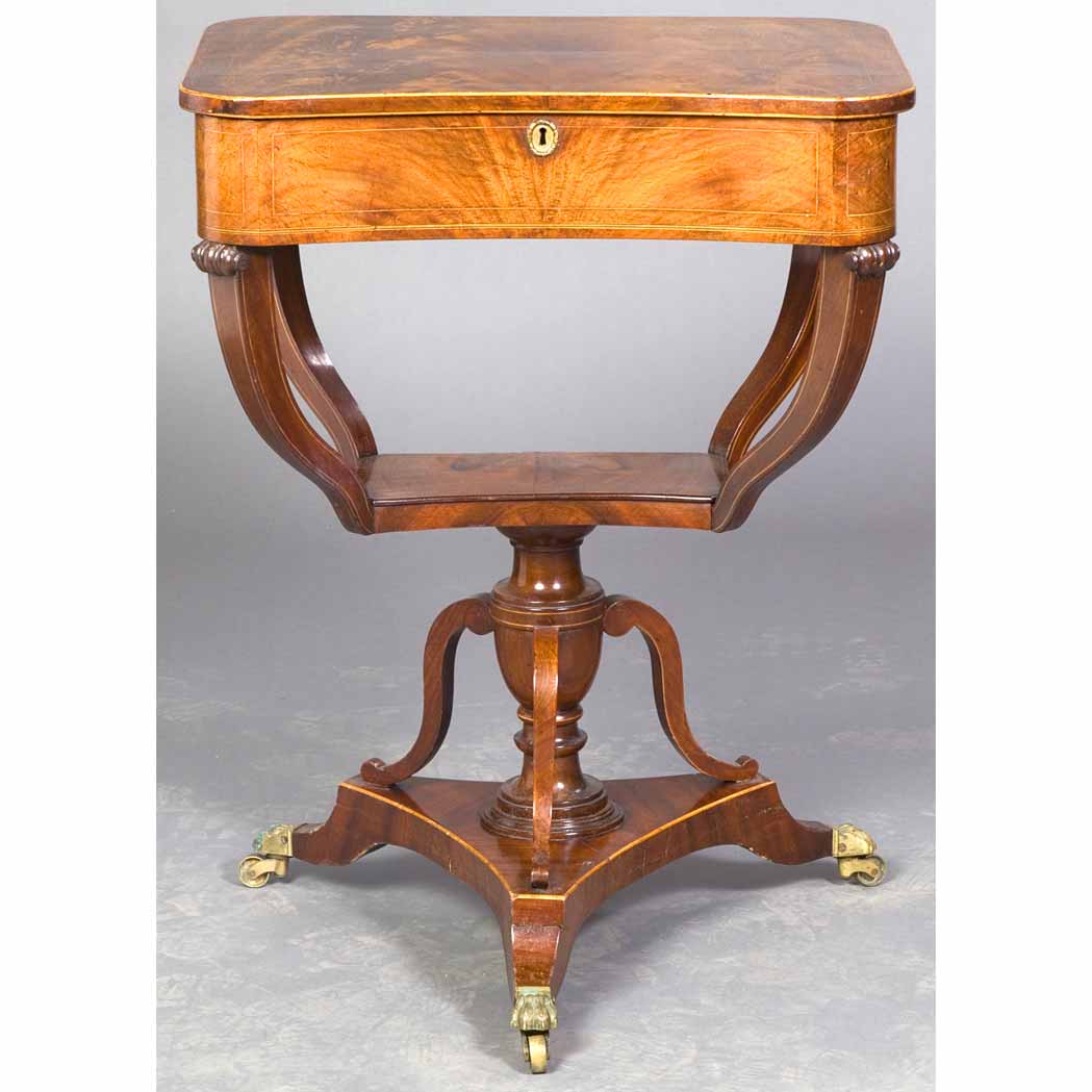 Appraisal: Regency Mahogany Sewing Table Circa The shaped rectangular line inlaid