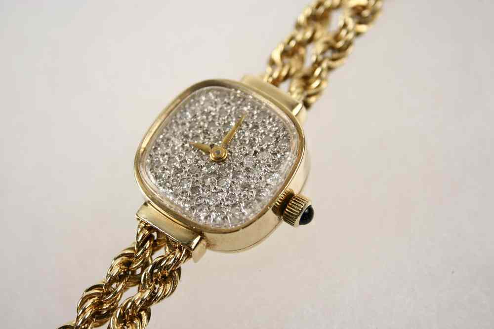 Appraisal: LADY'S WRISTWATCH - A K yellow gold wristwatch by Lucien