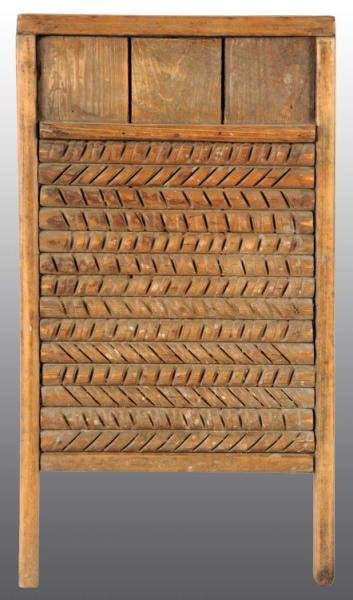 Appraisal: Wooden Washboard Description Carved wooden stationary rollers Condition Very Good