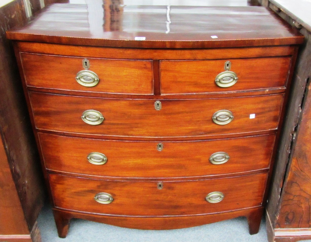 Appraisal: A th century inlaid mahogany bowfront chest of two short