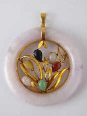 Appraisal: A yellow metal tests carat gold multi gem pendant approx