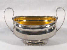 Appraisal: A large barge shaped silver sugar bowl with gadrooned rim