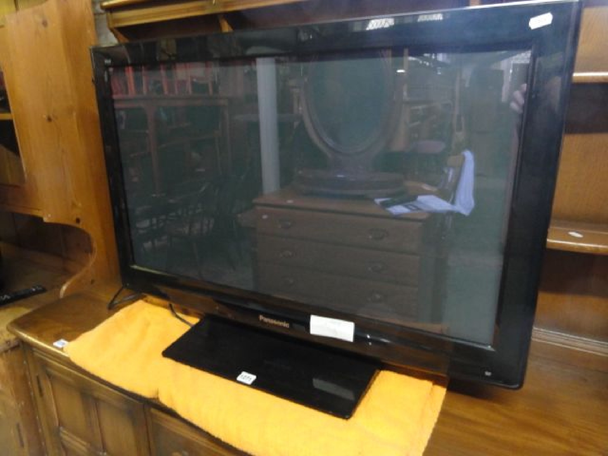 Appraisal: A Panasonic Viera in flat screen TV on a low