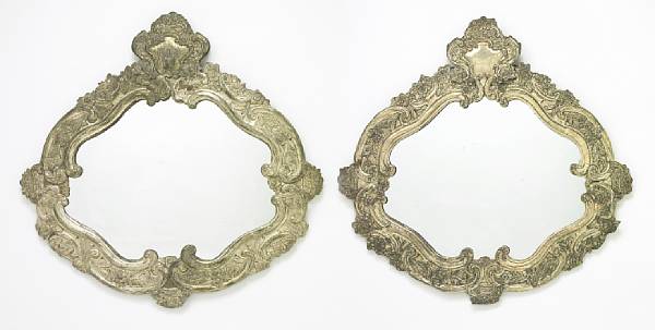 Appraisal: A pair of Dutch Baroque style silvered copper mirrors late