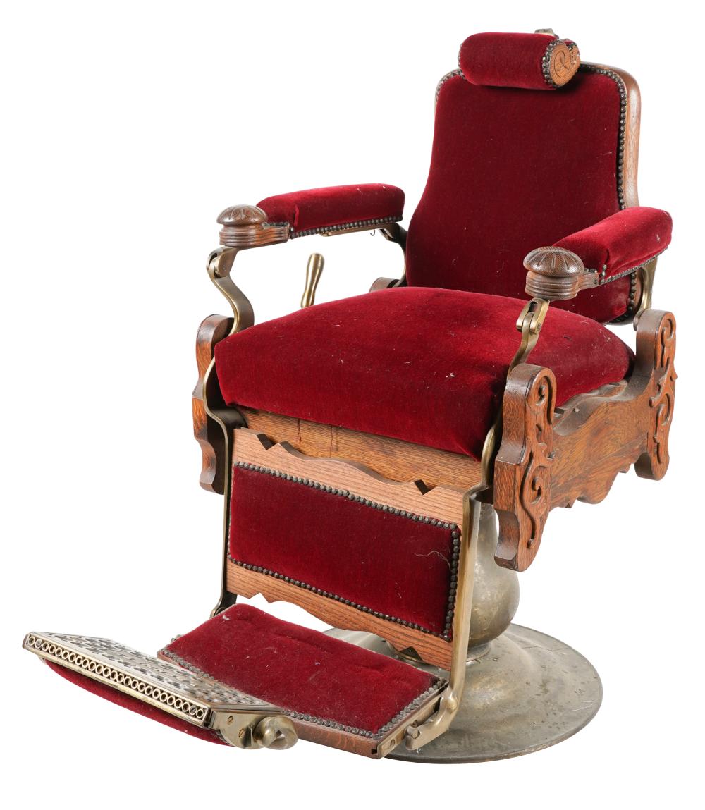 Appraisal: OAK AND STEEL BARBER'S CHAIRwith red mohair upholstery with working