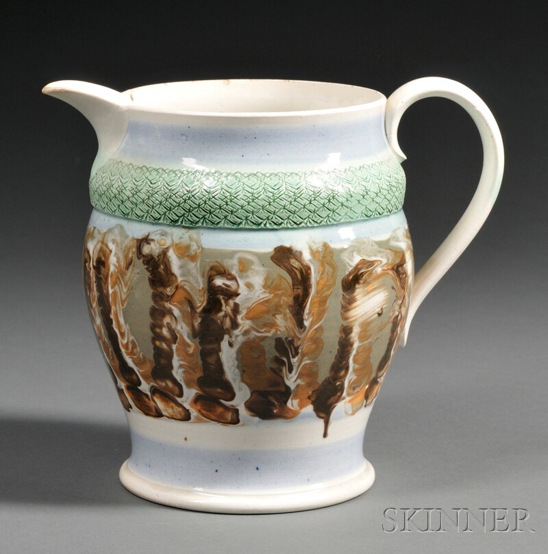 Appraisal: Mochaware Pottery Pitcher England th century baluster-form pitcher decorated with