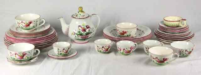 Appraisal: A French faience part tea and dinner service painted with