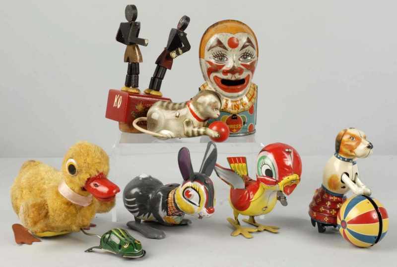 Appraisal: Lot of Miscellaneous Tin Wooden Toys Description Includes five animal