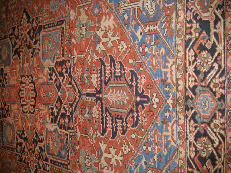 Appraisal: EARLY TH CENTURY HERIZ ROOM RUG The brick red field