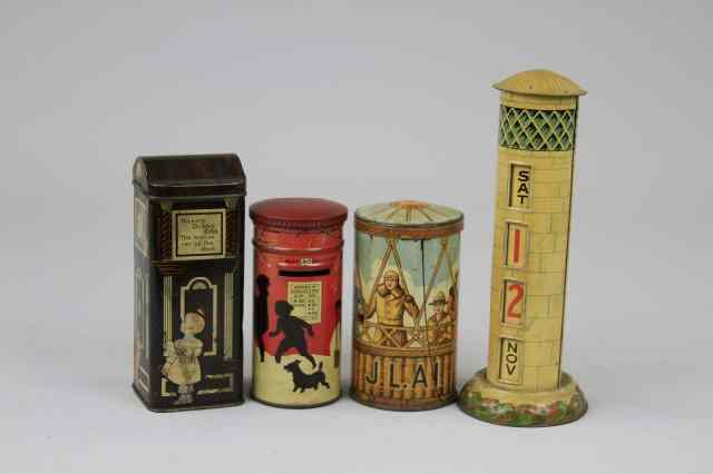 Appraisal: FOUR AMUSING TINS Lithographed tinplate Including a Lyons Toffee Lighthouse