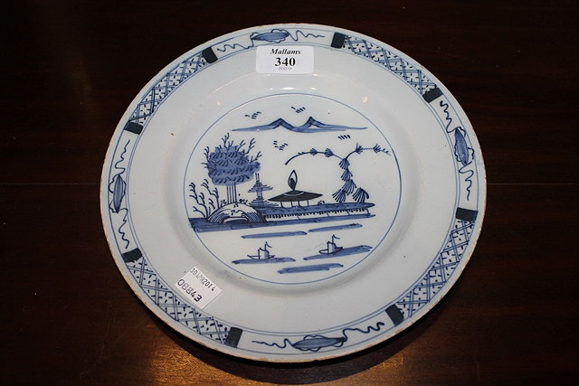 Appraisal: A LIVERPOOL DELFTWARE PLATE with Chinese style decoration circa cm