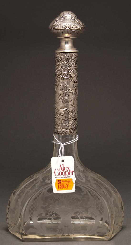 Appraisal: Continental repousse silver-mounted etched glass decanter early th century Rococo