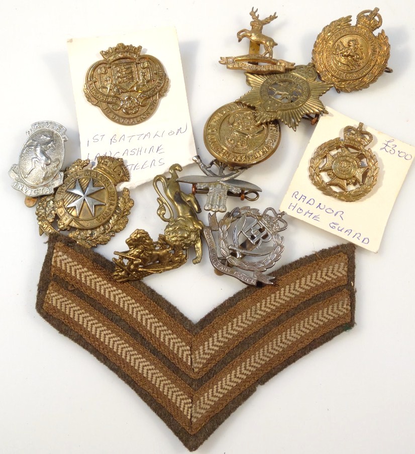 Appraisal: Various thC army cap badges to include First Battalion Lancashire