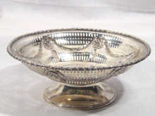 Appraisal: A Victorian pierced and embossed footed basket by Charles Stewart