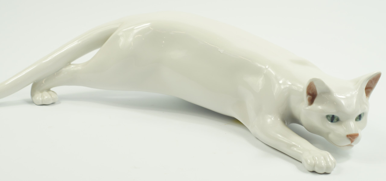 Appraisal: A Royal Copenhagen porcelain figure of a stalking white cat