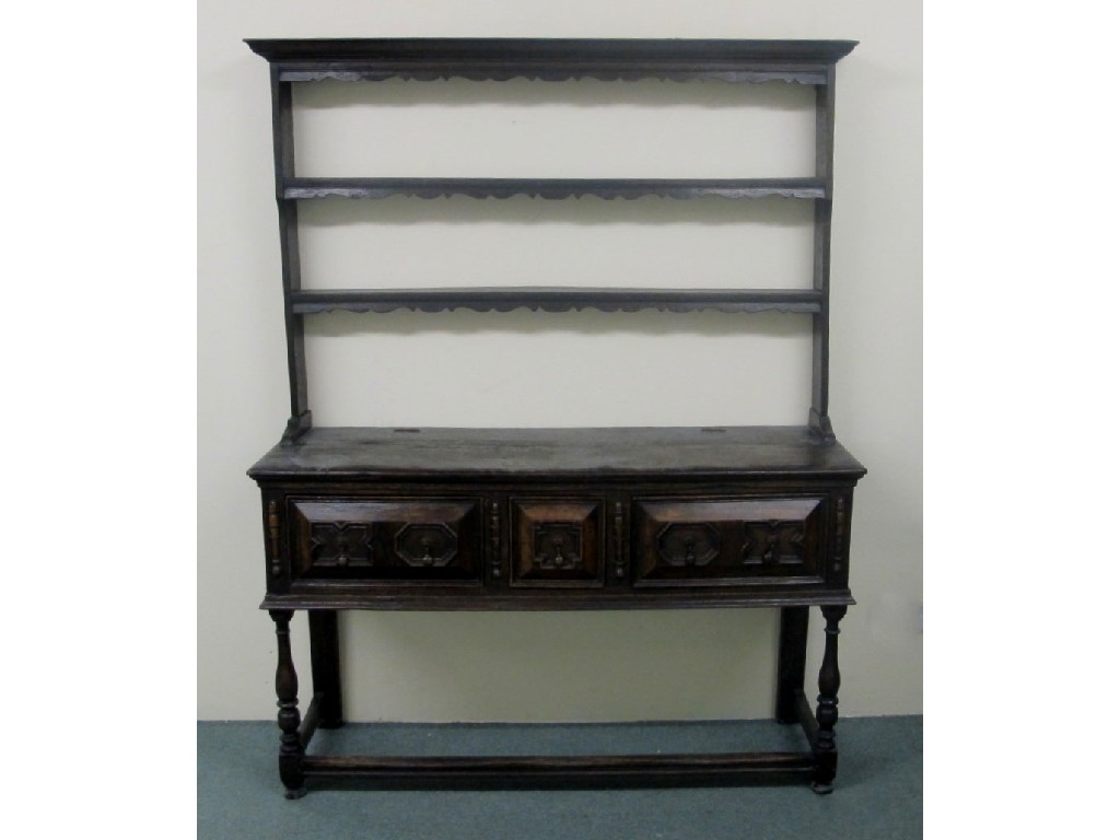 Appraisal: An th Century oak dresser the two tier Delft rack