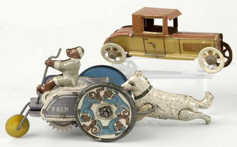 Appraisal: Lot of Tin Litho Vehicle Toys Description German Includes one