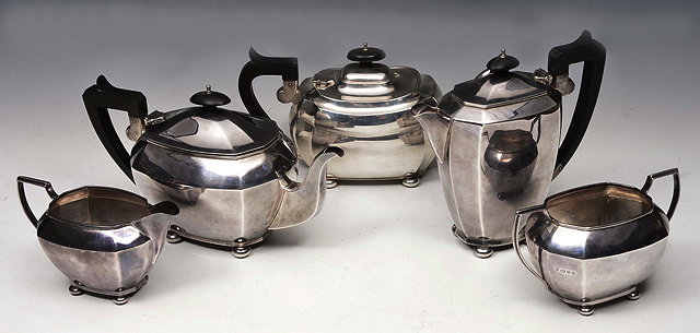 Appraisal: A SILVER FOUR PIECE TEA SERVICE comprising a teapot hot