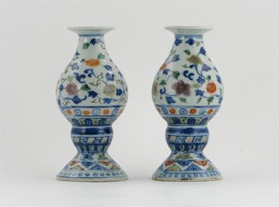 Appraisal: A pair of Chinese pear-shaped vases or candlesticks of Islamic