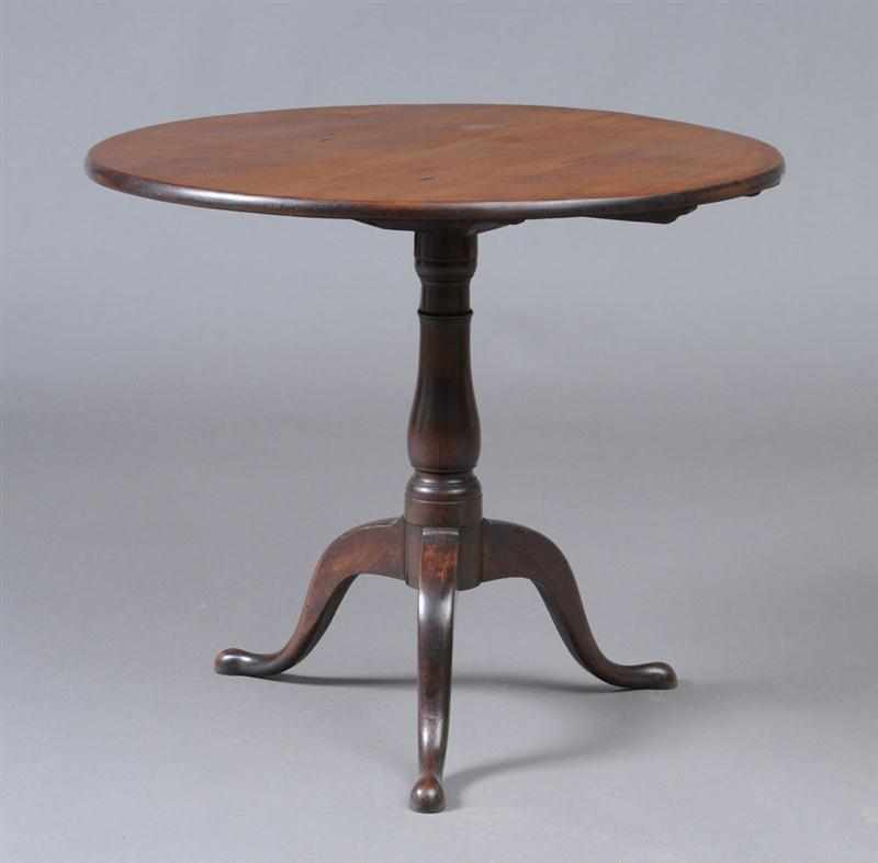 Appraisal: GEORGE III MAHOGANY TILT-TOP TEA TABLE The plain top on