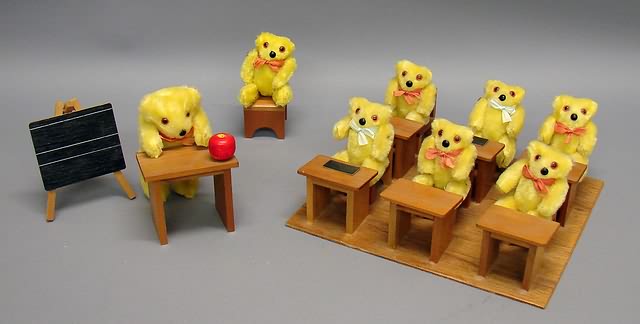 Appraisal: Miniature teddy bear school room Yellow plush jointed bears -