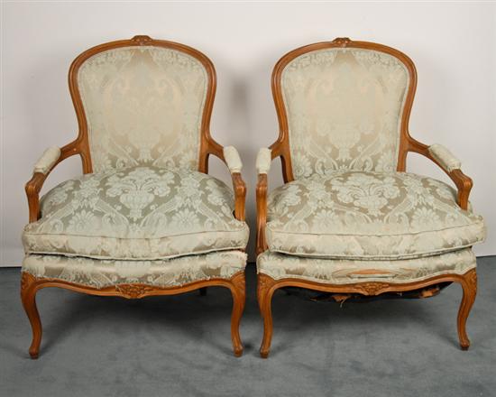 Appraisal: A Pair of Louis XV-style Fauteuil with carved and molded