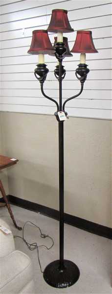 Appraisal: FOUR-LIGHT CANDELABRUM FLOOR LAMP Tiffany style having a bronzed metal