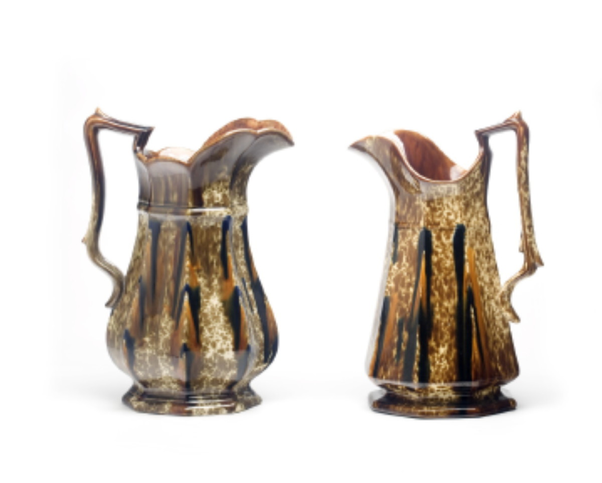 Appraisal: BENNINGTON FLINT ENAMEL PANELLED PITCHER CIRCA - Streaked in shades