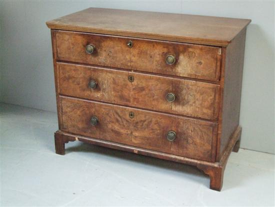 Appraisal: th century walnut chest of three drawers on bracket base