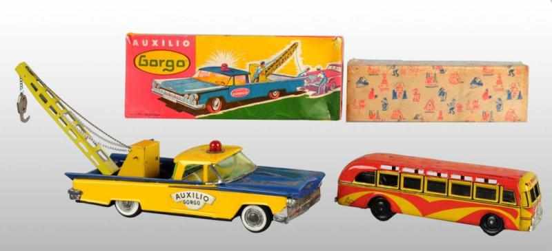 Appraisal: Lot of Tin Foreign-Made Vehicle Toys Description Circa s Working