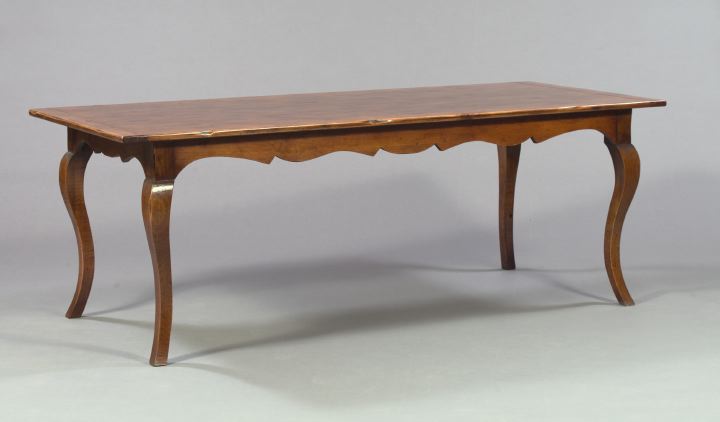 Appraisal: French Provincial Fruitwood Farmhouse Table the planked rectangular top above