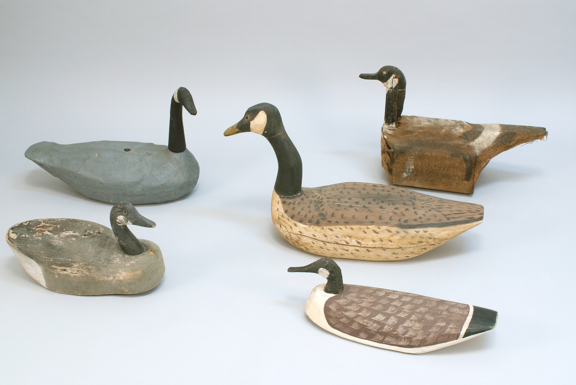 Appraisal: FIVE PRIMITIVE CANADA GOOSE DECOYS th CenturyBy various makers All