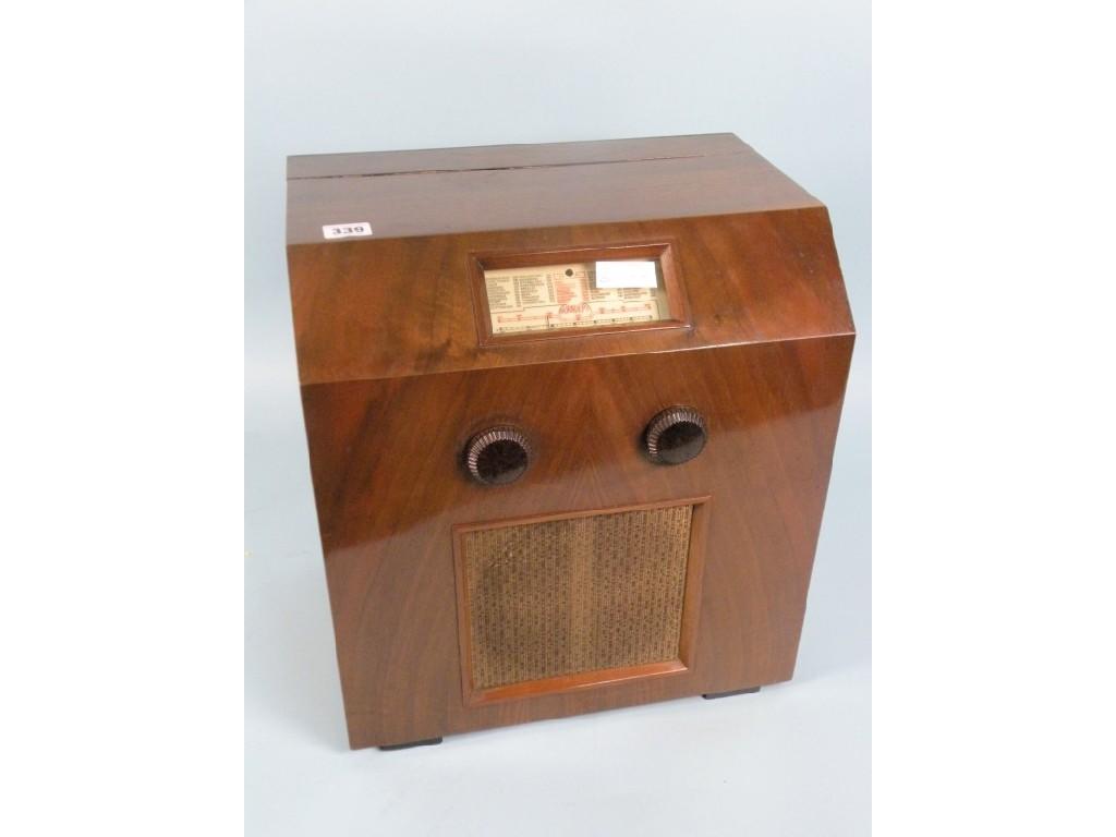 Appraisal: A Burndept radio in a walnut case with bakelite fittings