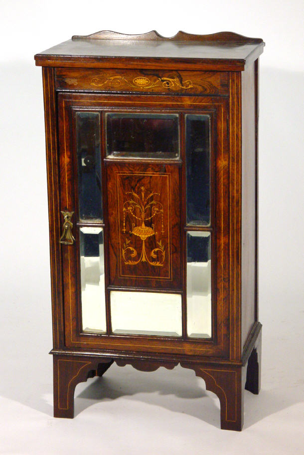 Appraisal: Victorian rosewood music cabinet with inlaid top and floral inlaid