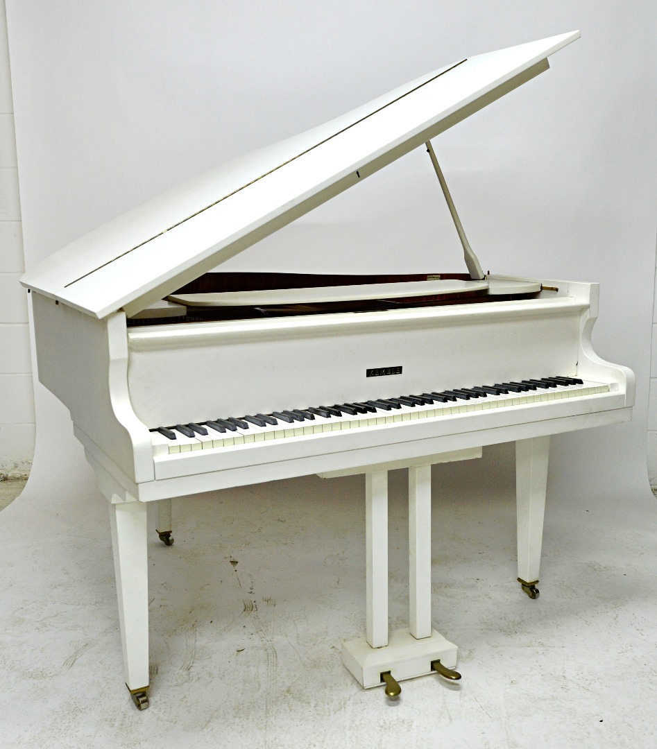 Appraisal: A white painted iron framed over strung baby grand piano