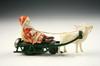 Appraisal: TOY SLEIGH - Celluloid and painted metal Santa and sleigh