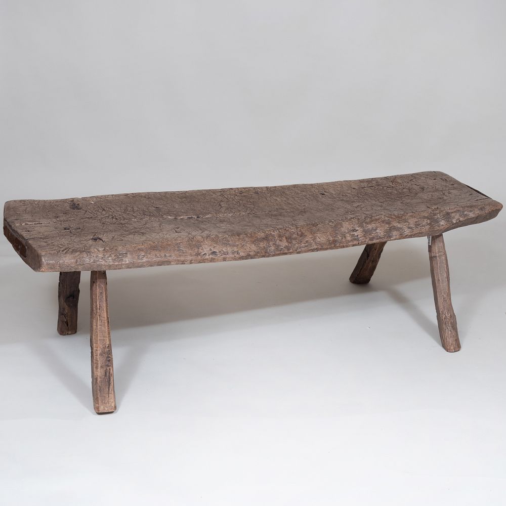 Appraisal: Rustic Wooden Bench Fitted with iron banding at the ends