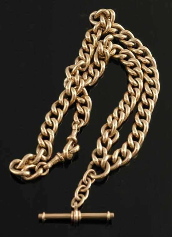 Appraisal: A gold fob chain The hollow curblink chain with T-Bar