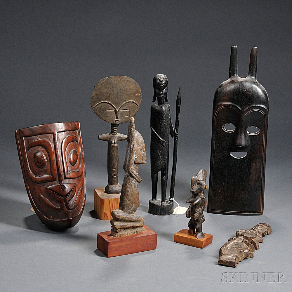 Appraisal: Seven Ethnic Wood Carvings includes five tourist items from Africa