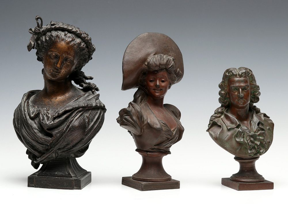 Appraisal: THREE PATINATED SPELTER BUSTS The larger a Classical maiden in