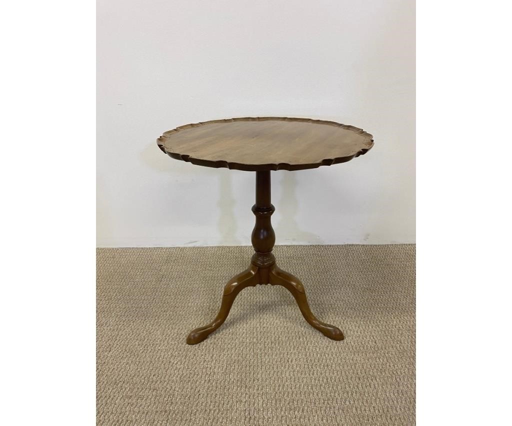 Appraisal: Georgian mahogany pie crust tea table with turned shaft and