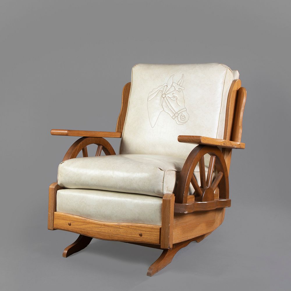 Appraisal: Leather Dude Ranch Chair with Wagon Wheel Detailing ca Leather