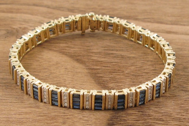 Appraisal: SAPPHIRE AND DIAMOND BRACELET The k yellow and white gold