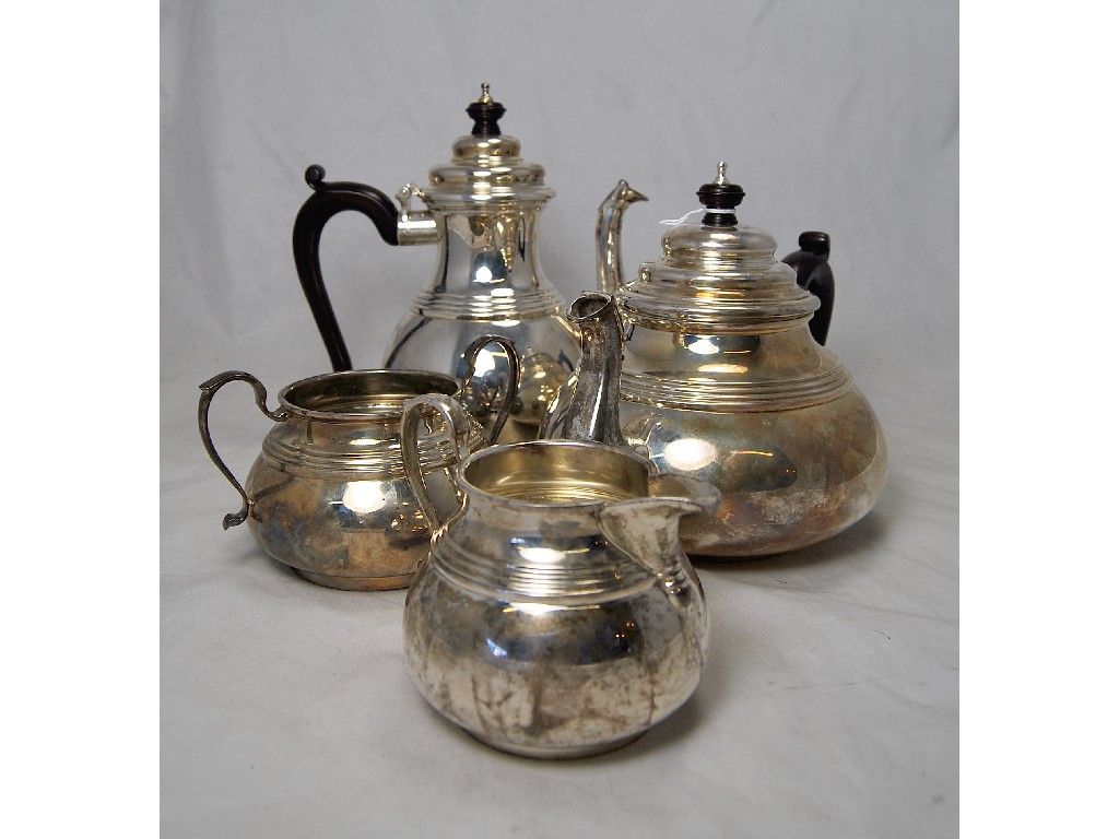 Appraisal: Four piece silver baluster tea service comprising tea pot hot